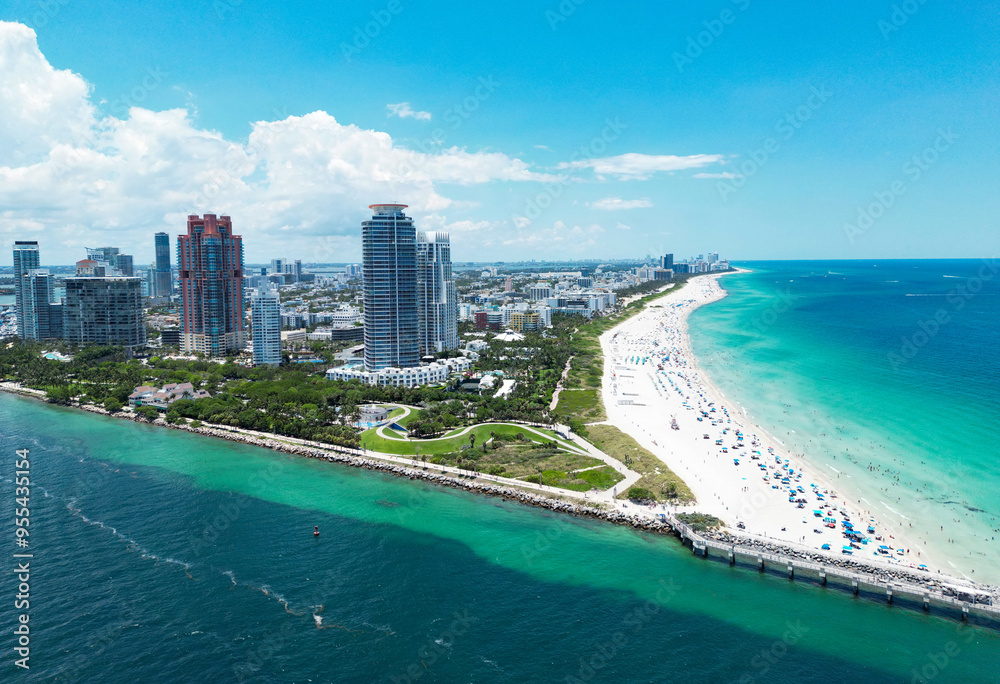 Aerial view of South Pointe Park. Miami Beach. Florida. USA. Summer holidays in Miami Beach. Aerial panoramic view of the city of Miami, buildings, marina, yachts and luxurious apartments. Aerial view of South Pointe Park. Miami Beach. Florida. USA. Summer holidays in Miami Beach. Aerial panoramic view of the city of Miami, buildings, marina, yachts and luxurious apartments.