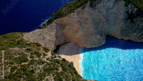 Aerial View of Azure Sea Water and Famous Navagio Beach with shipwreck | Zakynthos, Greek Island
