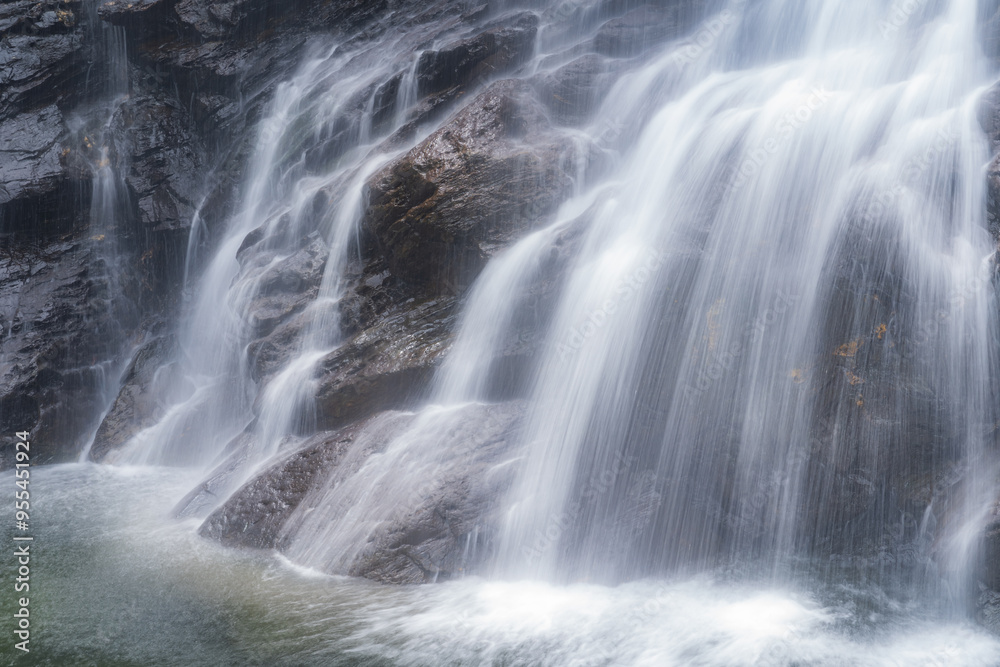 Beautiful waterfall in the middle of the jungles of Colombia surrounded by tropical vegetation and a feeling of peace