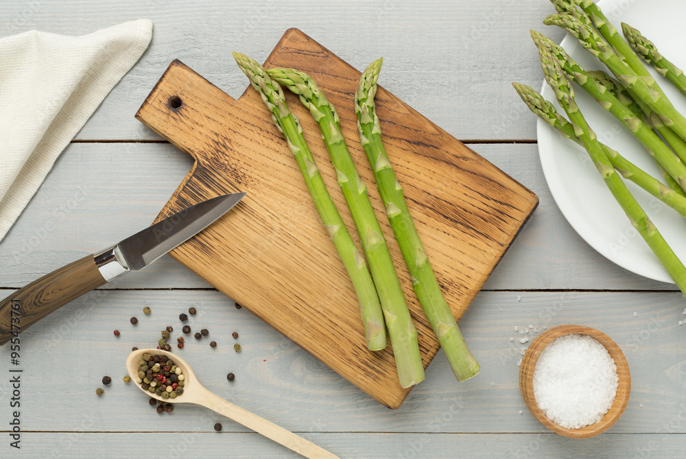 Fresh asparagus on wooden background, top view Fresh asparagus on wooden background, top view