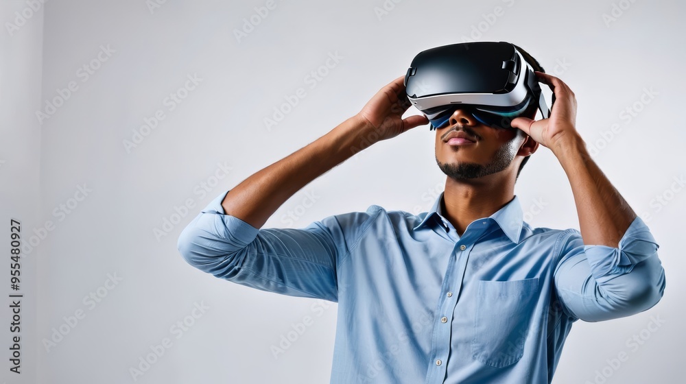 Man in Blue Shirt Holding Black Helmet Man in Blue Shirt Holding Black Helmet