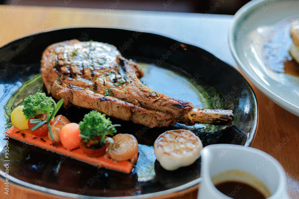 Fried pork chops with vegetables sauce and herbs Fried pork chops with vegetables sauce and herbs
