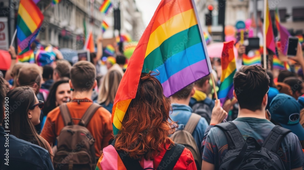 Naklejka premium Pride Parade Crowd With Rainbow Flags