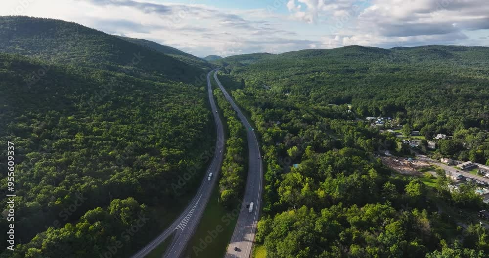 Lake George, NY, USA - August 20 2024, Sunny afternoon summer aerial video of the area surrounding Lake George, NY, USA	