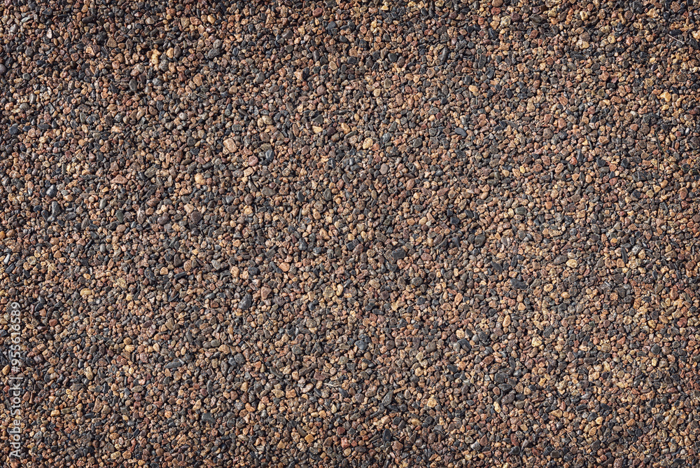 Small black brown stones, background, vignette. Small black brown stones, background, vignette.