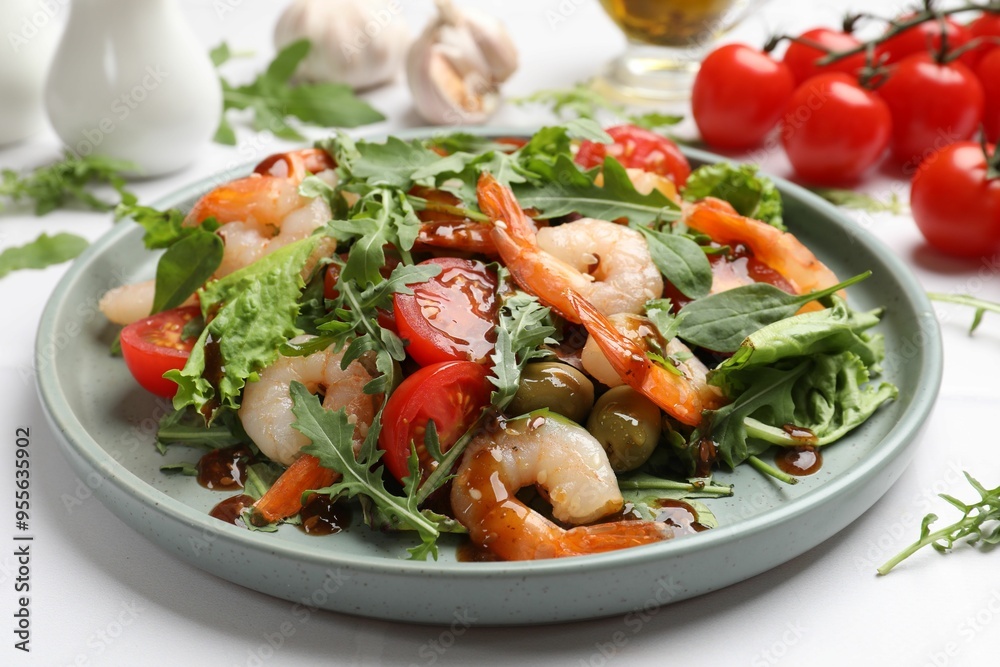 Delicious shrimp salad with vegetables on white table, closeup
