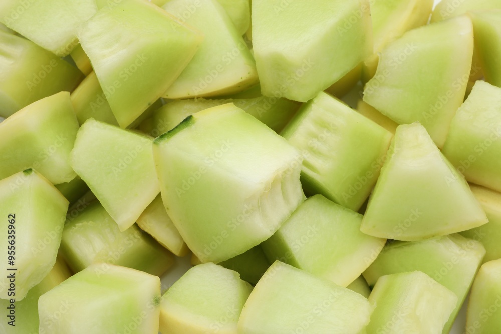 Many pieces of sweet honeydew melon, closeup Many pieces of sweet honeydew melon, closeup
