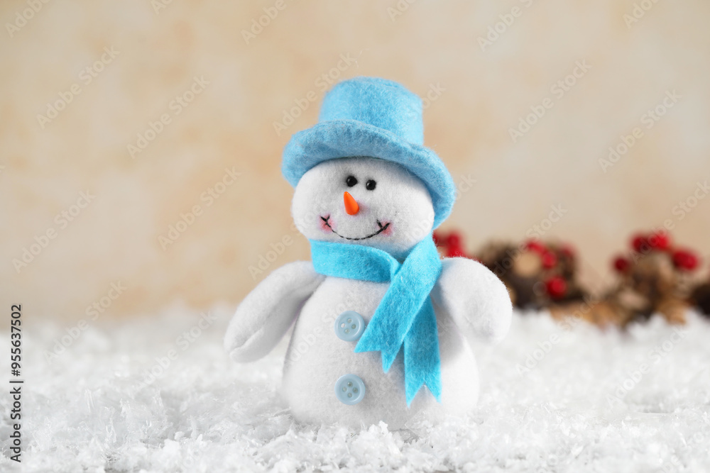 Funny decorative snowman figure on artificial snow Funny decorative snowman figure on artificial snow