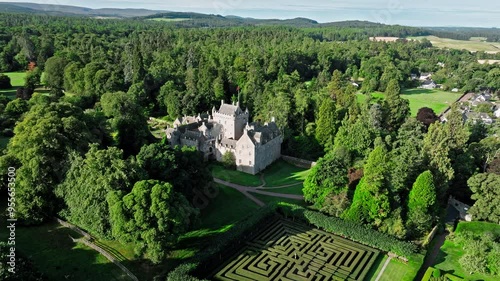 Aerial view of a Medieval Castle in Scotland, United Kingdom. Scottish fortress Cawdor Castle and Gardens. photo