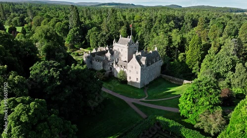 Aerial view of a Medieval Castle in Scotland, United Kingdom. Scottish fortress Cawdor Castle and Gardens. photo