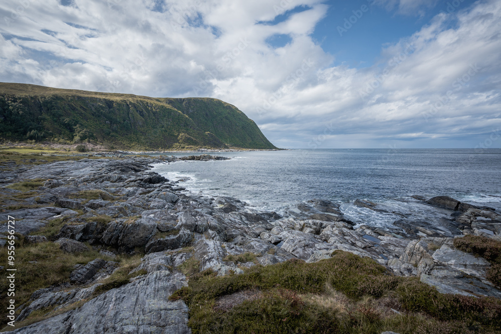 Rocky landscape view of norwegian coast with windy weather Rocky landscape view of norwegian coast with windy weather