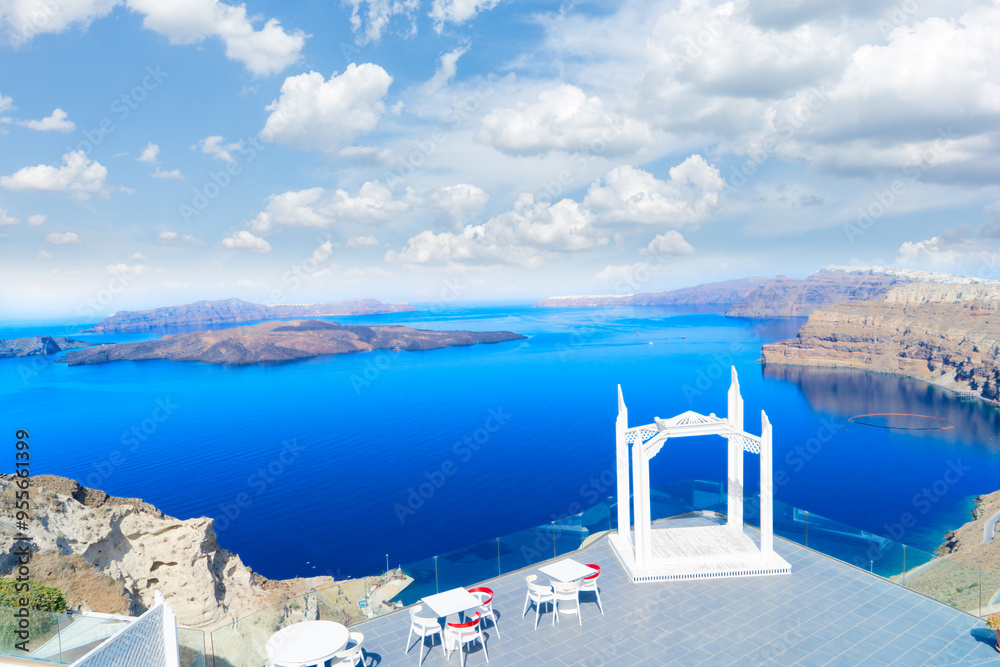 Fototapeta premium cafe table with caldera view, wedding arch, Santorini's beautiful details