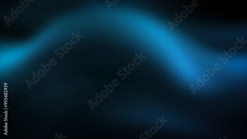 A dark, atmospheric 4K gradient featuring smooth waves of deep blue and black. This grainy, abstract background is ideal for creating modern, moody visuals with a sleek and sophisticated touch photo