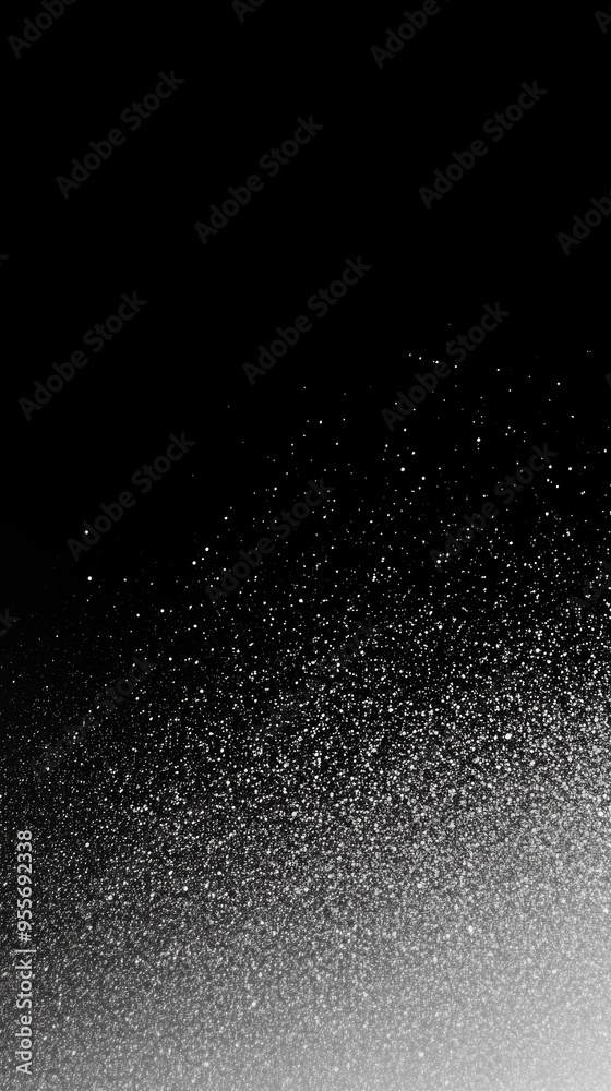 Fototapeta premium Gradient glitter sparkle on a black background creating a starry night effect