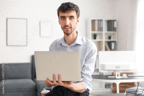 Young businessman working w...