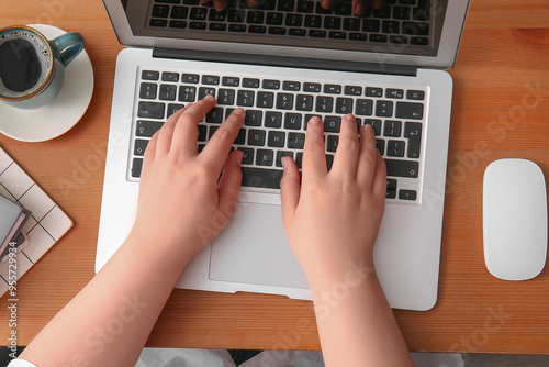 Female programmer using lap...