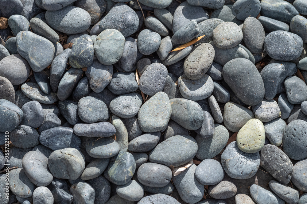 Black Rounded Stones on an Ocean Beach. Black Rounded Stones on an Ocean Beach.