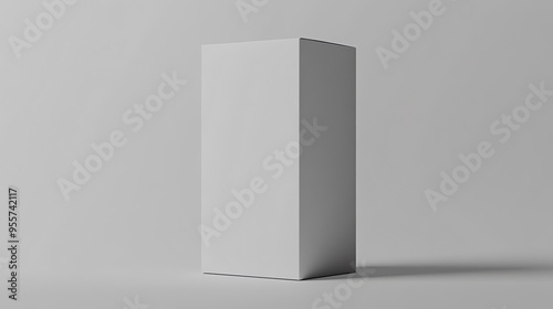 Obraz na płótnie Tall, White Cardboard Box on a Gray Background w salonie