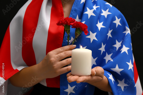 Woman with USA flag holding...