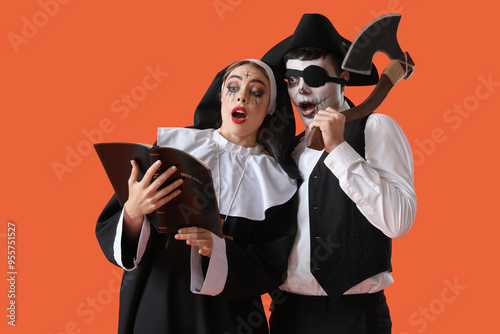 Young couple in costumes fo...