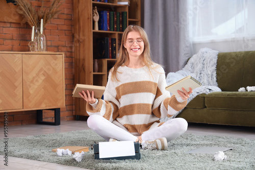 Female author with book and...