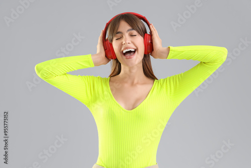 Young woman in headphones o...