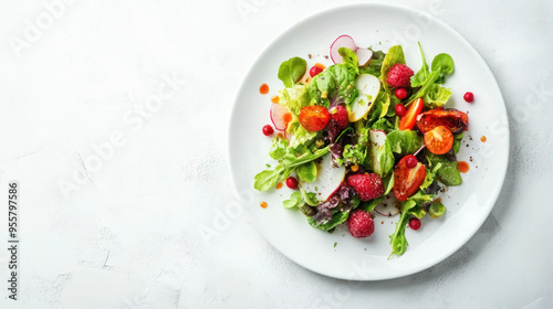 gourmet fresh salad with colorful ingredients on a luxurious white plate, with copy space for text
