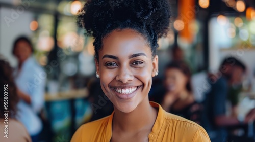 Bright Smiling Woman in a Modern Cafe with Warm Lighting and a Vibrant Atmosphere