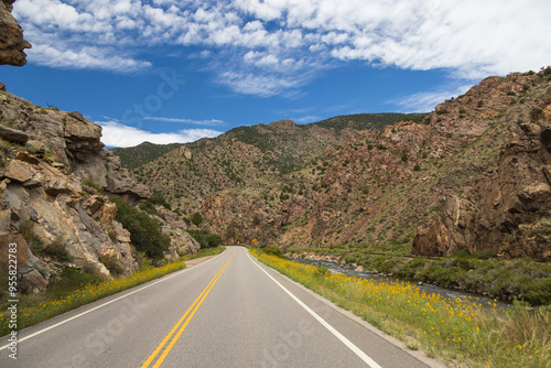 Road beside the Arkansas River flowing through Royal Gorge Canyon, Colorado