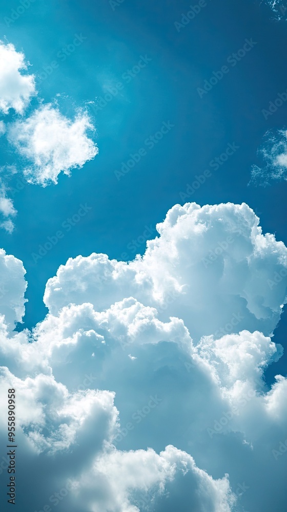 A serene sky filled with fluffy white clouds, illuminated by bright sunlight, creating a calm and peaceful atmosphere. A serene sky filled with fluffy white clouds, illuminated by bright sunlight, creating a calm and peaceful atmosphere.