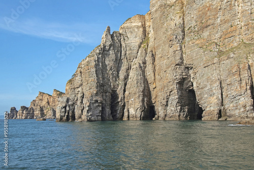 Summer view of sea caves and rock cliffs at Dumujin of Baengnyeongdo Island near Ongjin-gun, South Korea