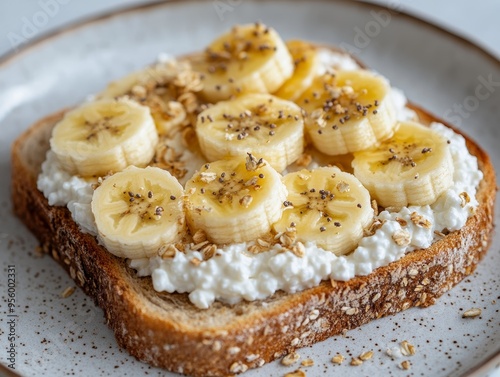 Whole wheat bread topped with cottage cheese and sliced bananas, brain-boosting breakfast, healthy and delicious.