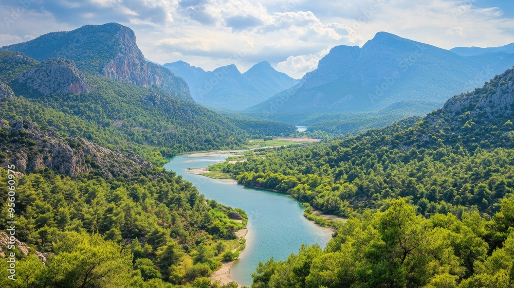 A scenic view of the Taurus Mountains with lush green forests and winding rivers. A scenic view of the Taurus Mountains with lush green forests and winding rivers.