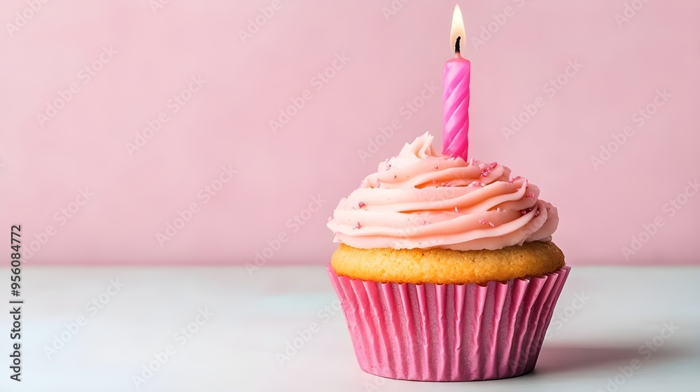Single Pink Frosted Cupcake with Candle. Single Pink Frosted Cupcake with Candle.