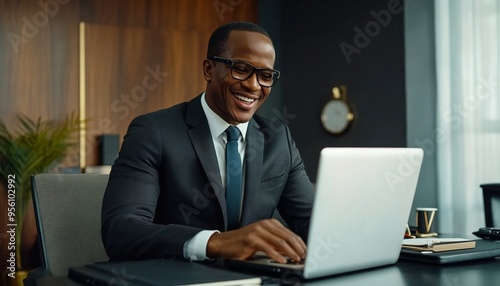 happy Professional in Modern Office: Smiling Businessman Using Laptop for Work. Inclusive Corporate Culture, Freedom, and Productivity. High-Definition Illustration for Marketing, Workplace Wellness,