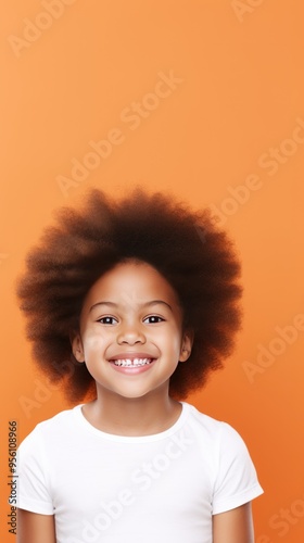 Coral background Happy black american african child Portrait of young beautiful kid Isolated on Background ethnic diversity equality acceptance 