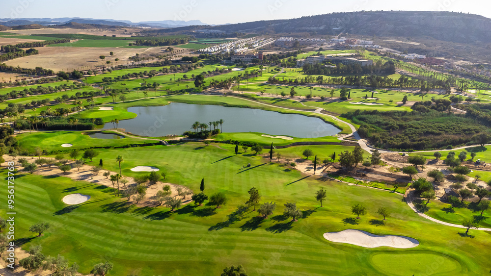 Wide aerial view of a luxury green golf course Wide aerial view of a luxury green golf course
