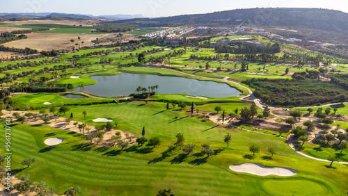 Wide aerial view of a luxury green golf course