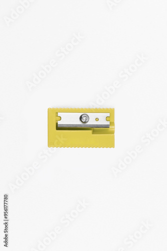 Isolated yellow pencil sharpener on white