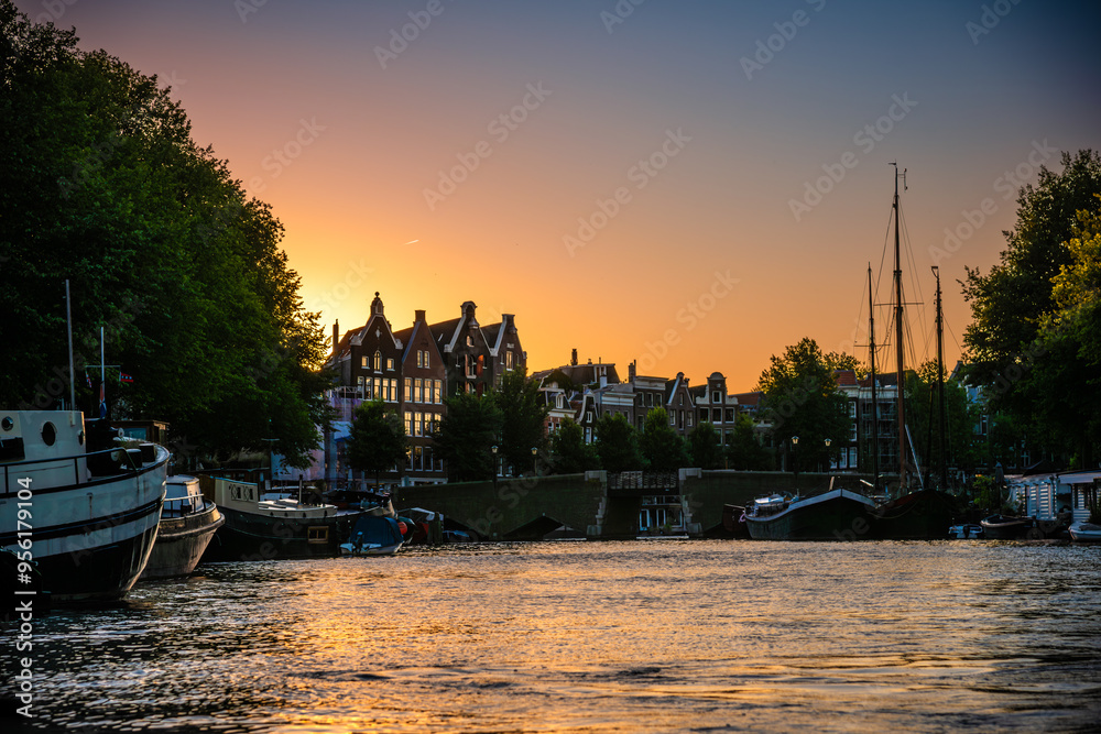 Naklejka premium Amsterdam Canal and Gabled Houses at Sunset - Netherlands