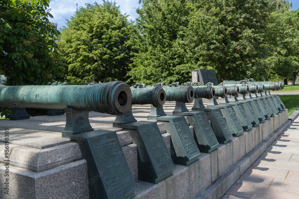 Ancient copper cannons are installed as monuments on territory of the Moscow Kremlin. Gun barrels is in good condition. Color of gun barrels is green. Sunny summer day. Moscow, Russia – June 14, 2024 Ancient copper cannons are installed as monuments on territory of the Moscow Kremlin. Gun barrels is in good condition. Color of gun barrels is green. Sunny summer day. Moscow, Russia – June 14, 2024