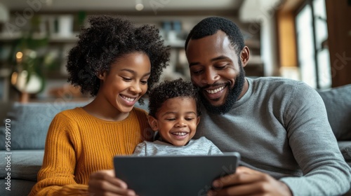 A family using a tablet to organize a virtual storytime, fostering connection and routine in a blended family environment.