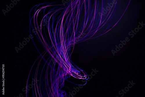 Purple and blue light trails swirling against black background