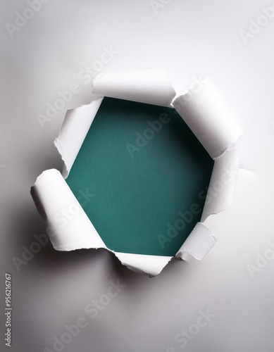 a white paper hole torn