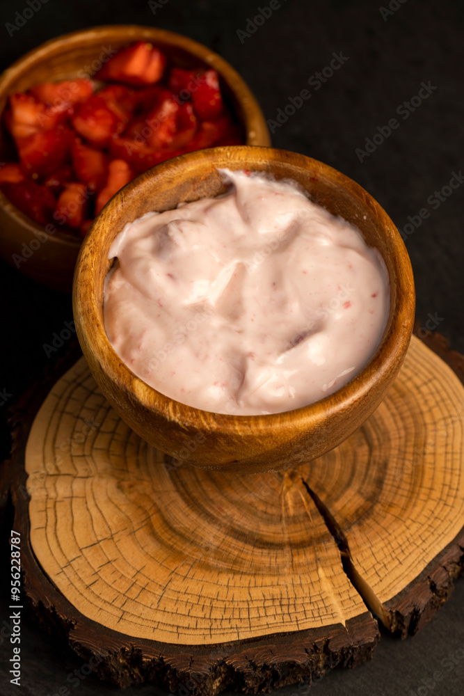 fresh natural yogurt with added strawberry flavor with berries fresh natural yogurt with added strawberry flavor with berries