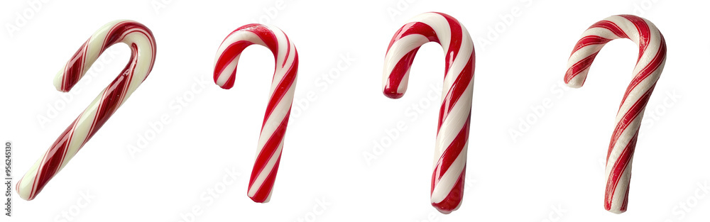 Fototapeta premium A falling Christmas candy cane isolated on a white background, clipped path, full depth of field