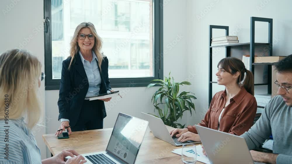 Senior businesswoman arriving at office in start-up business