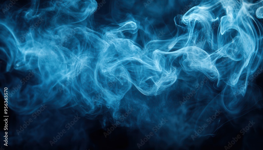 Mysterious blue smoke swirling gracefully against a dark background, creating an ethereal and captivating atmosphere. Mysterious blue smoke swirling gracefully against a dark background, creating an ethereal and captivating atmosphere.