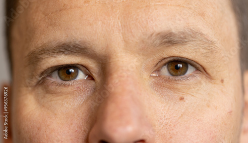 Close-up of man's eyes, focusing on facial expression and eye detail