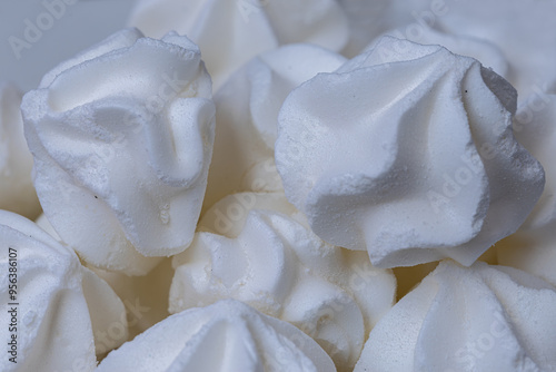 Obraz na płótnie Porcelain plate full of fluffy white meringue. Indoors close-up. w salonie